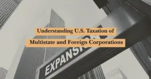 A cityscape with tall office buildings and a sign reading "EXPANSION," overlaid with the text "Understanding U.S. Taxation of Multistate and Foreign Corporations.